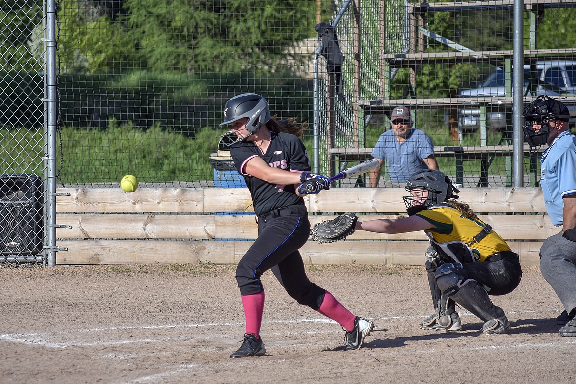 Libby freshman Bethany Thomas hits a single in the fourth inning of the Lady Loggers&#146; 11-0 win over Whitefish Monday, May 14. (Ben Kibbey/The Western News)