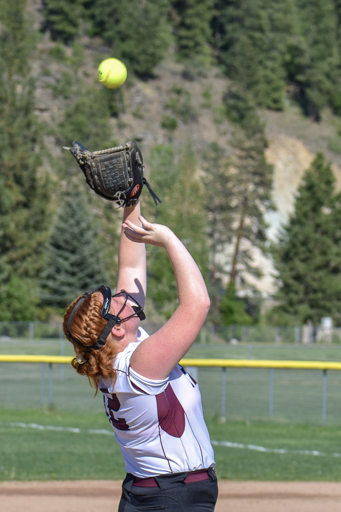 Troy sophomore third baseman Montana Rice catches a fly out to end the first inning, during the Lady Trojans&#146; 16-14 play-in win against the Lady Hawks Tuesday, May 15.