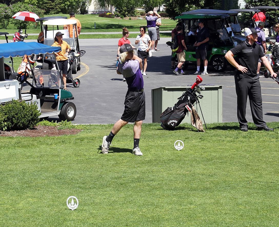 Tyler Gibbons tees off from hole 1 during his second day at the 3A state golf competition.