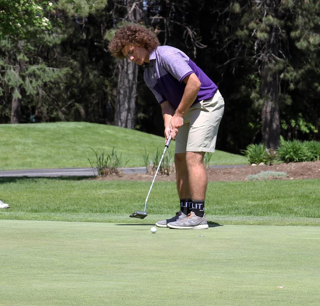 Chase Jerome puts for birdie during his final round at the state golf competition.