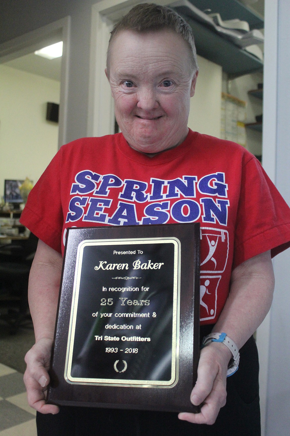 Richard Byrd/Columbia Basin Herald
Karen Baker, who has Down Syndrome, could barely contain her excitement on Friday when she was honored by Tri-State Outfitters for her 25 years of employment at the company. Bakers manager says she has been a dedicated employee over the years and is a valuable asset to the team at Tri-State Outfitters.