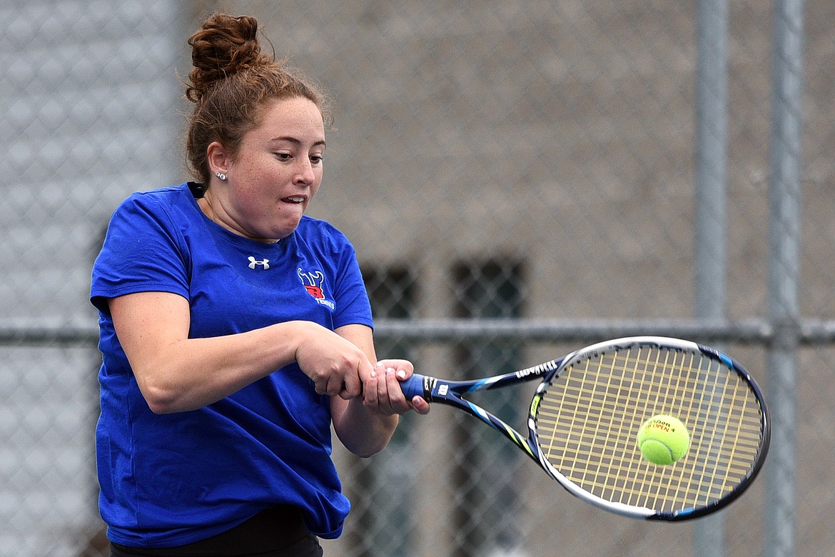 Bigfork&#146;s Ellie Berreth hits a return in a match against Bigfork teammate Lara Guenzler at Montana Athletic Club-Bigfork on Friday. (Casey Kreider/Daily Inter Lake).