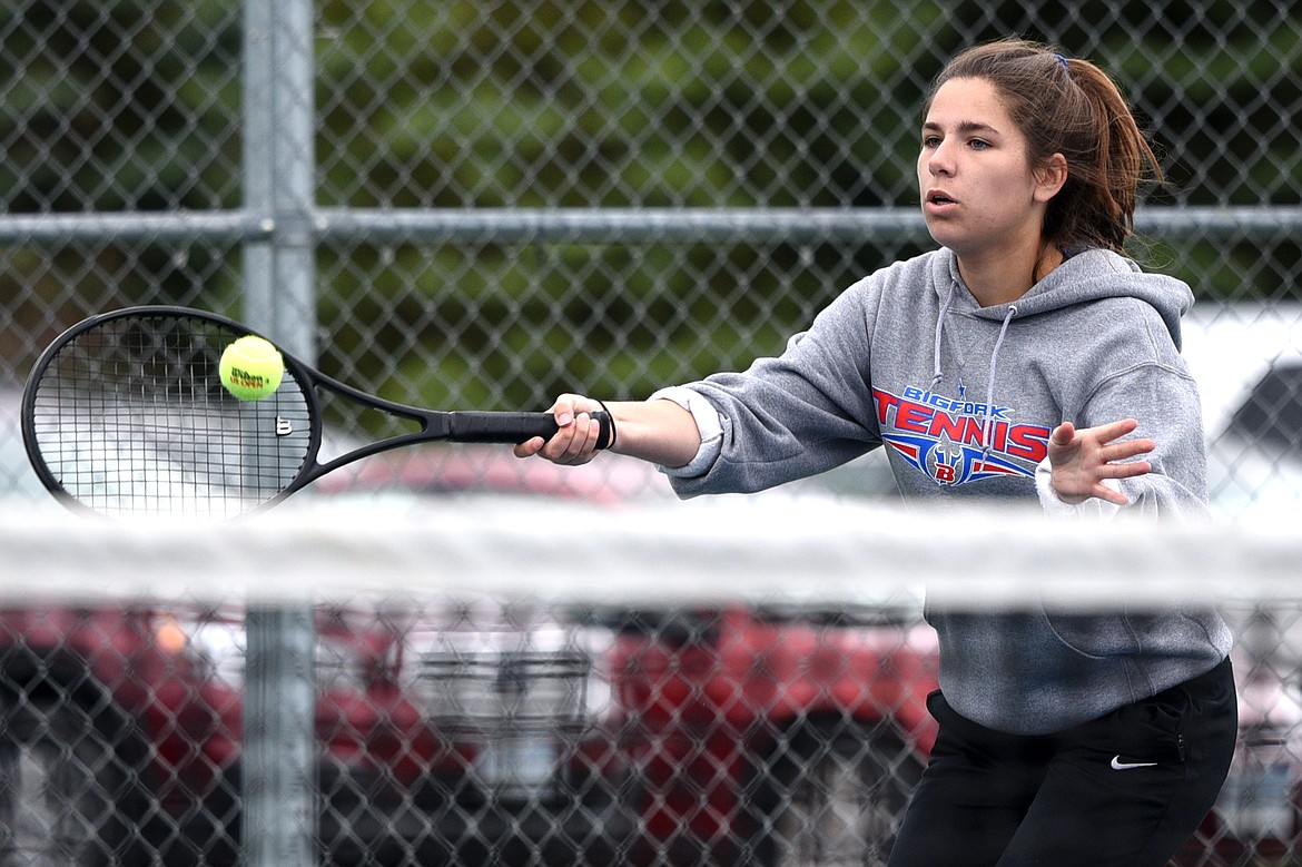 Bigfork&#146;s Lara Guenzler hits a return in a match against Bigfork teammate Ellie Berreth at Montana Athletic Club-Bigfork on Friday. (Casey Kreider/Daily Inter Lake).