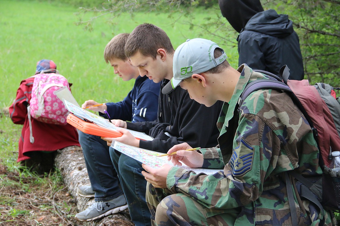 (Photo by MARY MALONE)
Map reading was one of several skills required of Idaho State Forestry Contest participants on Thursday during the 2018 event, held at the Delay Farm in Careywood.