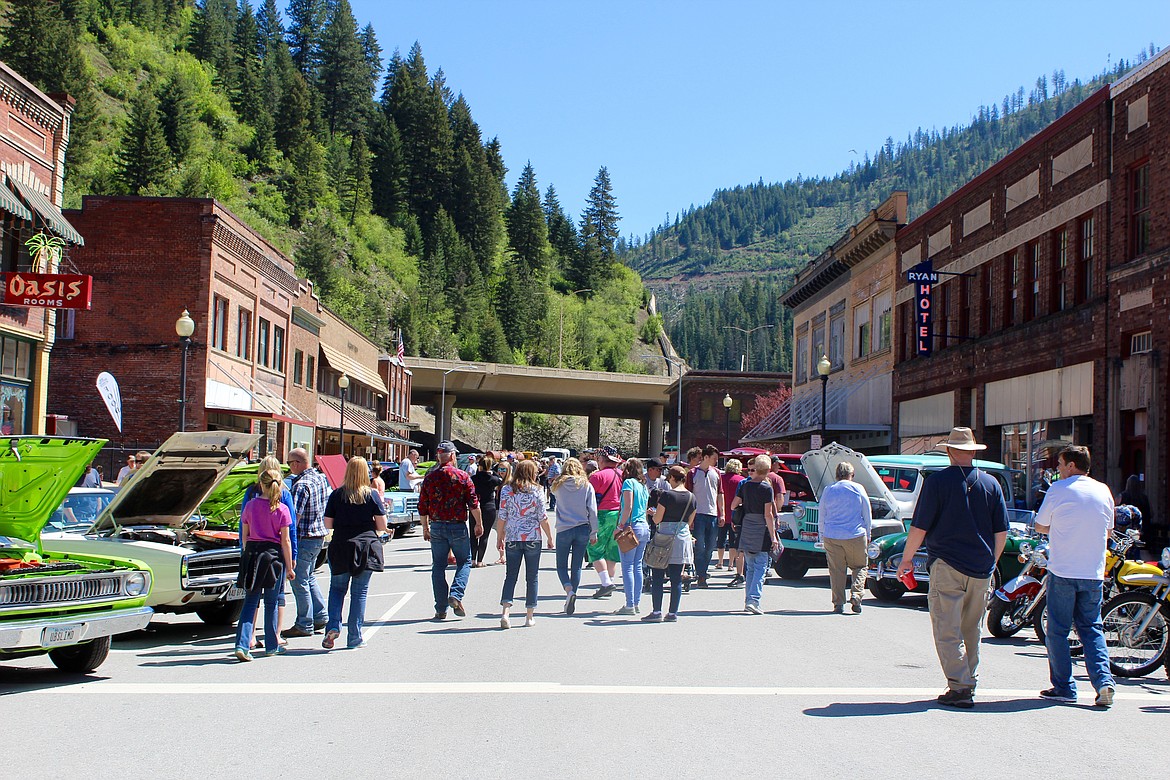 Attendees check out more vintage cars parked on both sides of Cedar Street. Cars stretched from the end of Cedar to Harry Magnuson Way.