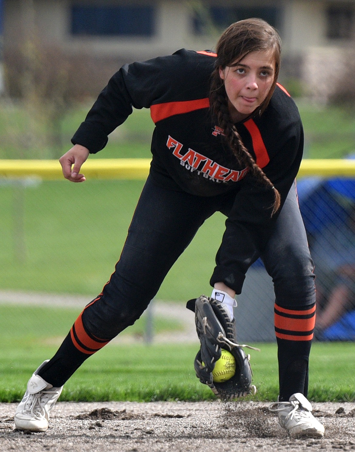 Flathead shortstop Riley Chouinard looks to throw to first on a ground ball in the third inning against Glacier. (Casey Kreider/Daily Inter Lake)