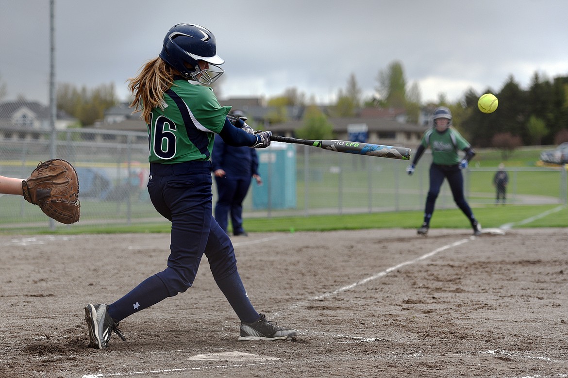 Glacier&#146;s Addie Labrum connects on an RBI single in the first inning against Flathead at Kidsports Complex on Thursday. (Casey Kreider/Daily Inter Lake)