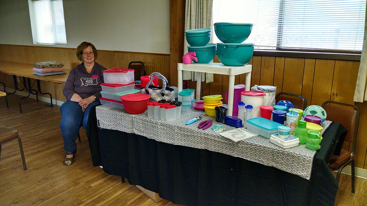 Laura Howard displays tupperware during the first Spring Bazzar of the year. (Clark Fork Valley Press)