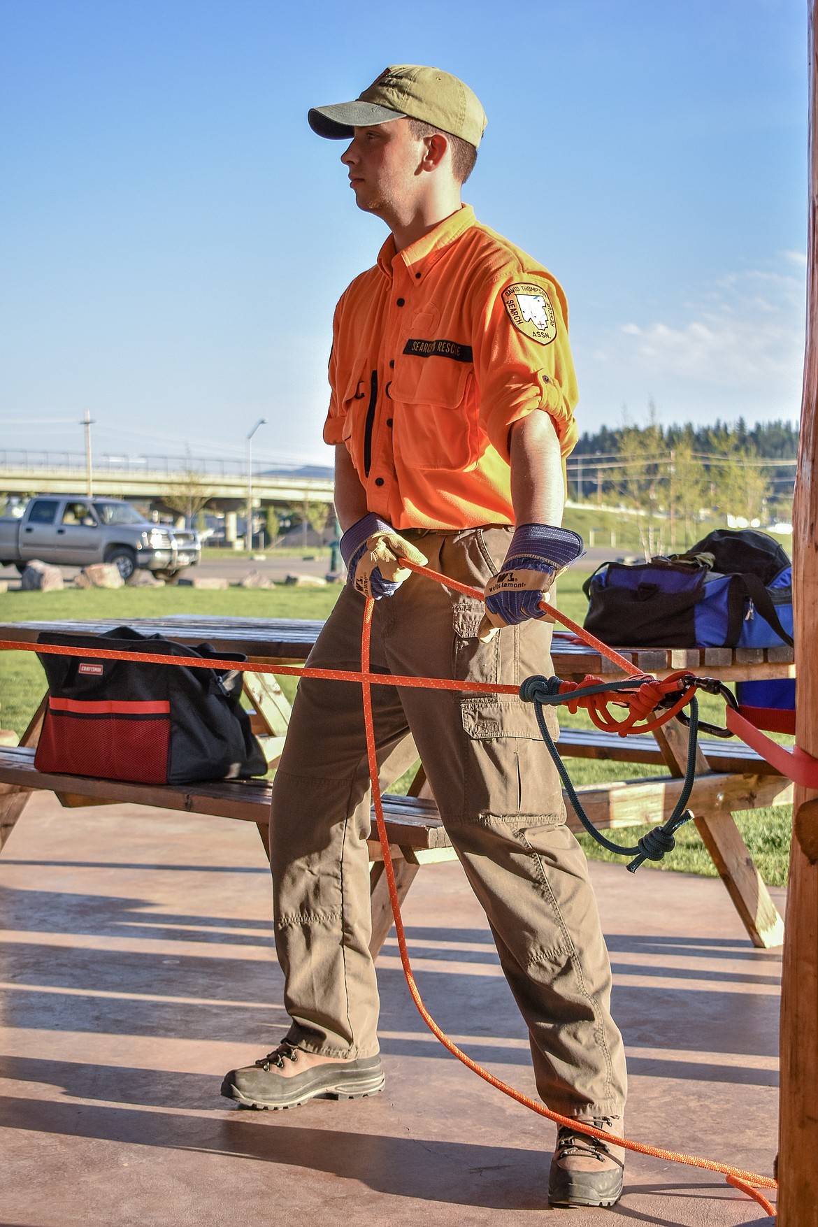 High School senior Caleb Thomas, a member of David Thompson Search and Rescue Junior Unit, belays during a simulation of raising an injured person up a cliff face during monthly training, May 7. (Benjamin Kibbey/The Western News)