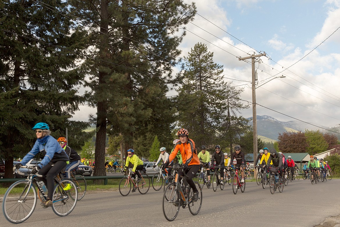 The first of three waves of riders leaves Libby&#146;s Fireman&#146;s Park, kicking off the 23rd Annual Scenic Tour of the Kootenai River, about 7:50 a.m. Saturday, May 13, 2017. (John Blodgett/The Western News file photo)