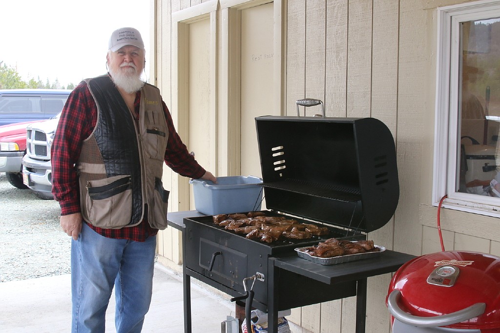 James Daniels, chef of the day, cooking the 6 oz. petit steaks for lunch at the Duke Guthrie Memorial Shoot.