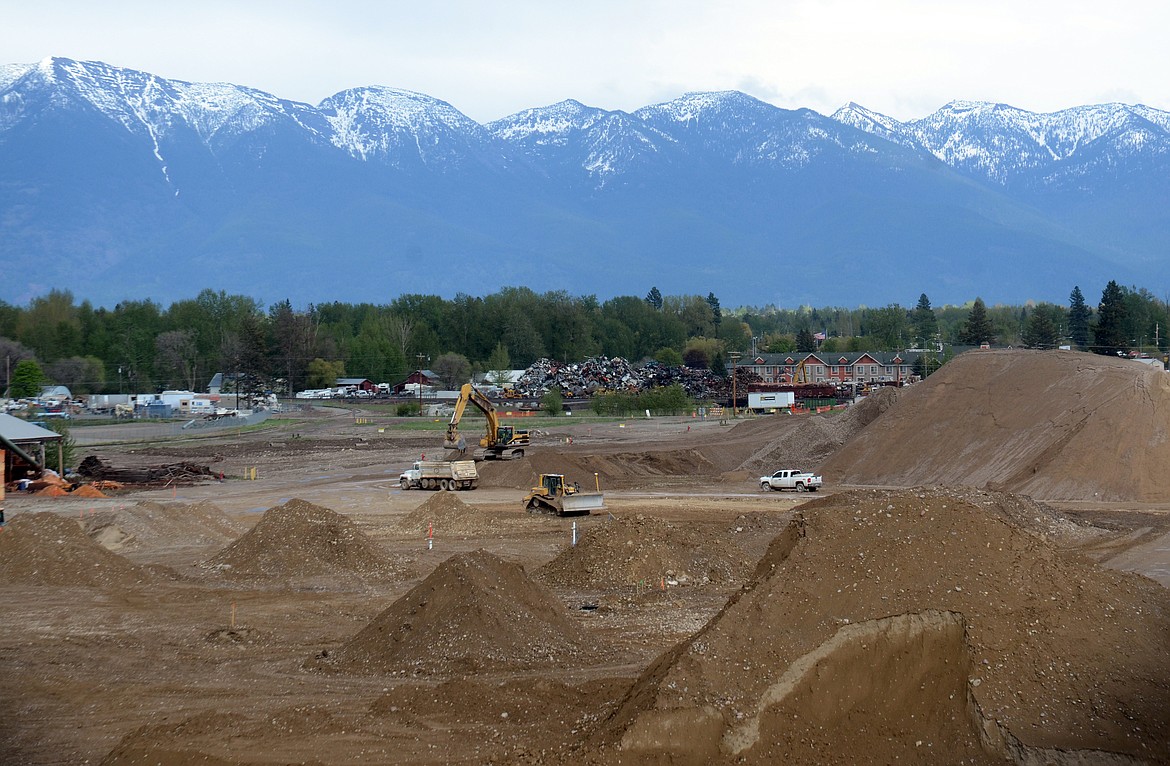 Construction crews work at the site of the new Glacier Rail Park in Evergreen on Thursday, May 10. (Matt Baldwin/Daily Inter Lake)