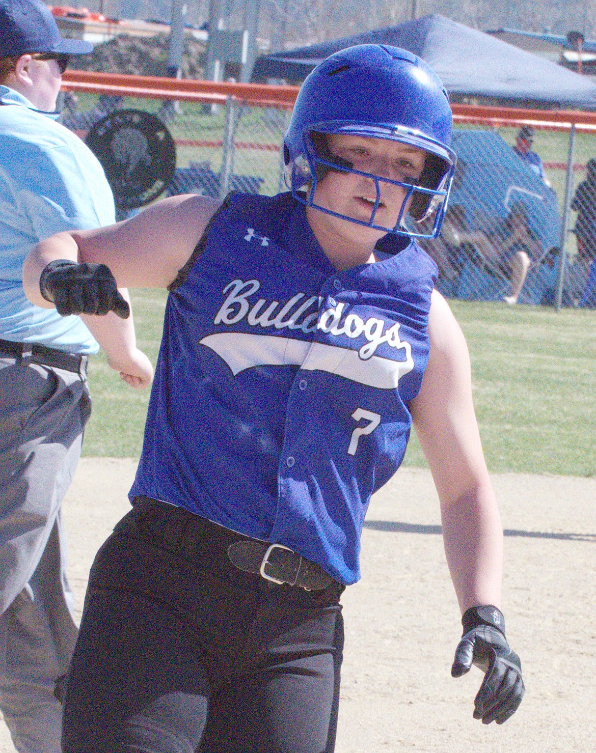 M-A-C baserunner Frankie Smith (7) rounds the bases on the way home in a recent tournament game against Browning High School at Frenchtown High School. (Jason Blasco/Lake County Leader)