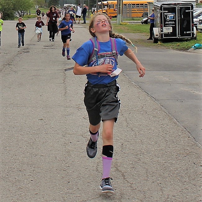 Heather Haskins, a Superior 5th graders, came in first for the girls during the 5K race on May 7.