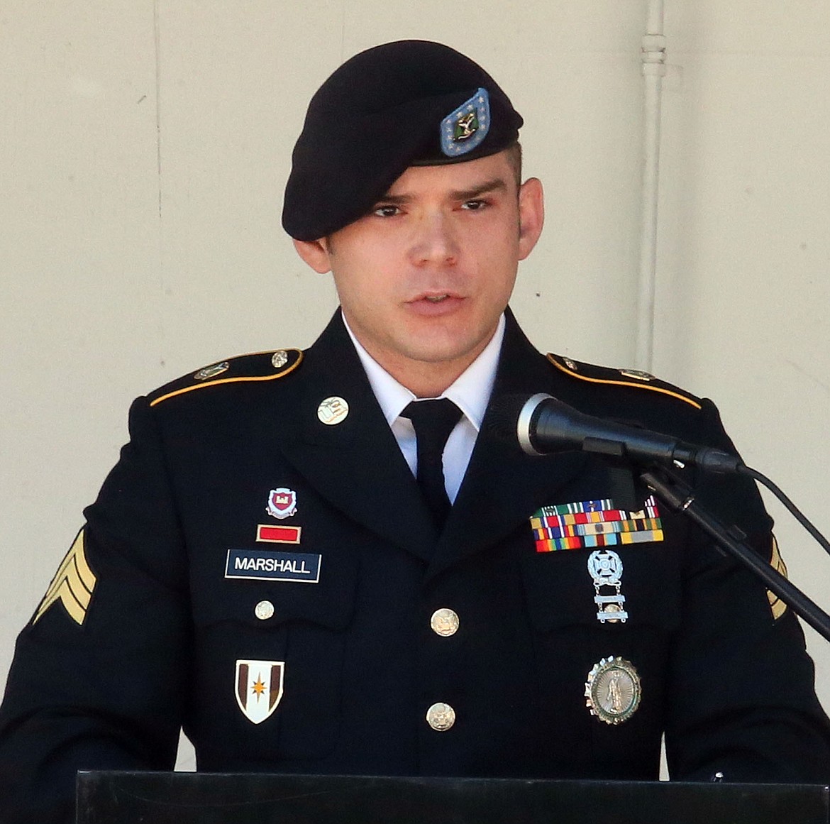 Sgt. Danial Marshall of the Idaho Army National Guard exhorted his audience Monday to celebrate the lives of troops who died in combat. (JUDD WILSON/Press)