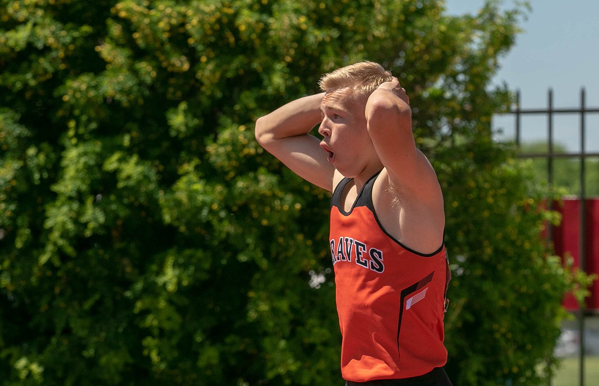 Flathead&#146;s Chad Hemsley reacts to seeing his state winning time of 38.09 seconds in the 300 hurdles at the Class AA state track meet in Great Falls on Saturday. (Kylie Richter photo)