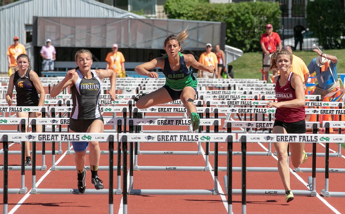 Glacier&#146;s Faith Brennan competes in the finals of the 100 hurdles at the Class AA state track meet in Great Falls on Saturday. (Kylie Richter photo)