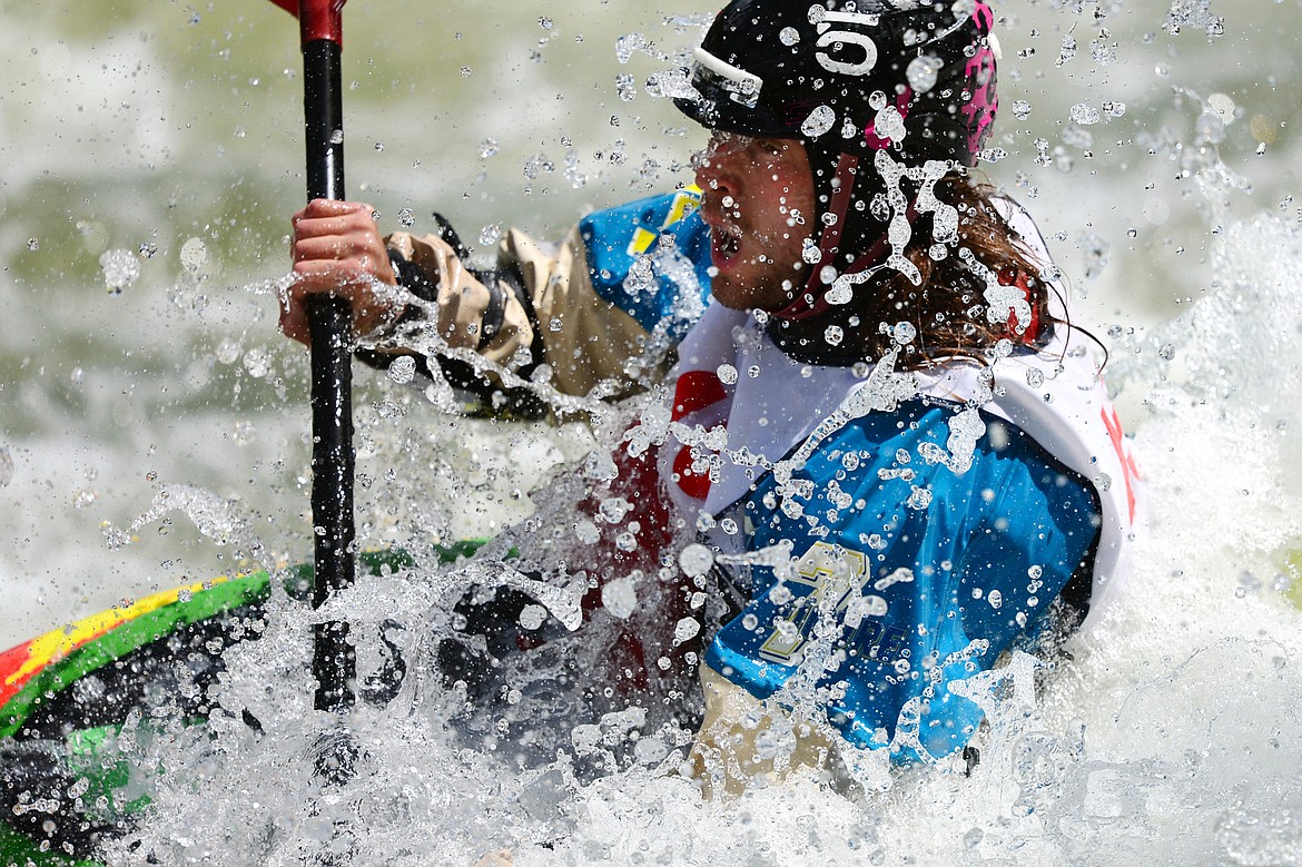 Kayakers navigate the Swan River during the Expert Slalom event at the Bigfork Whitewater Festival in Bigfork on Saturday. (Casey Kreider/Daily Inter Lake)