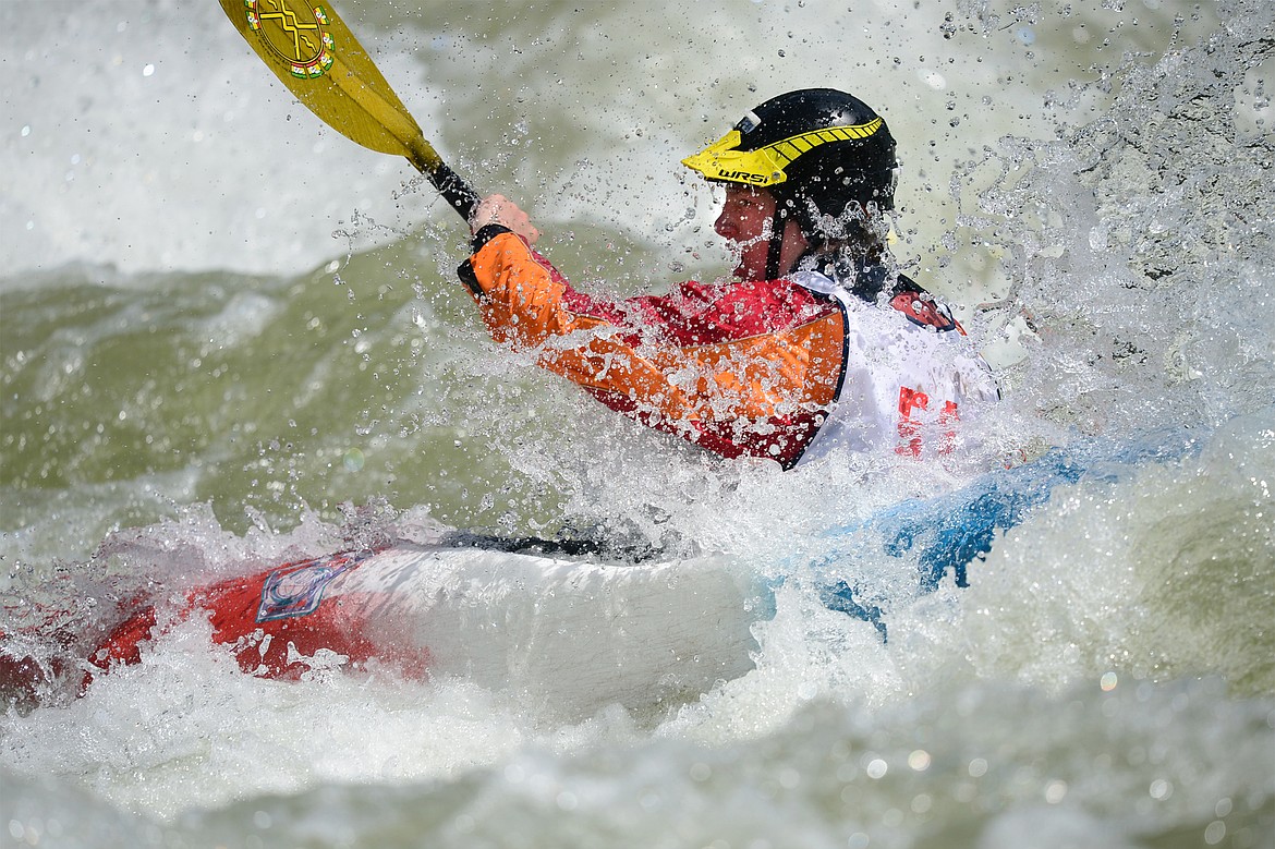 Kayakers navigate the Swan River during the Expert Slalom event at the Bigfork Whitewater Festival in Bigfork on Saturday. (Casey Kreider/Daily Inter Lake)