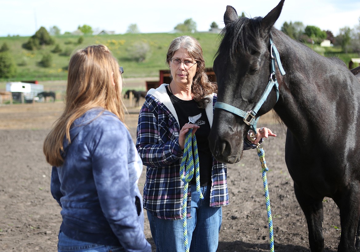 Natalie Norrell gives XX instructions before handing over Tony&#146;s lead rope. (Mackenzie Reiss/Daily Inter Lake)