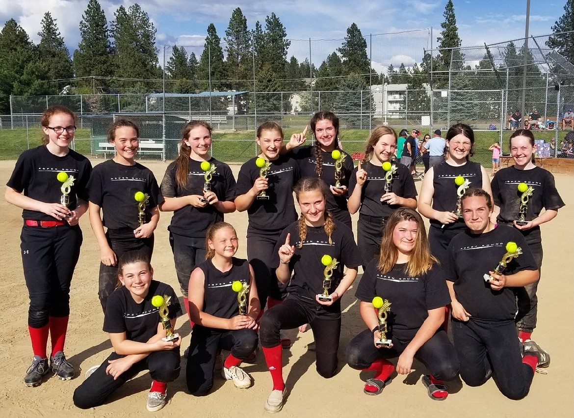 Courtesy photo
Aspen Sound from Coeur d&#146;Alene won the KGSA Varsity Division (14U) tournament championship game May 20 at Finucane Park in Hayden. 
Aspen Sound won all three pool play games. Aspen beat Bashaw Electric 9-8, as Matea Dorame and Sadie Zimmerman both hit RBI doubles. Aspen beat NNAC 9-1. Matea Dorame hit her first home run of the season, Alex Torres hit an inside-the-park HR, and Kristine Schmidt and Sadie Zimmerman both hit doubles. Dorame also struck out seven in three innings. Aspen beat Maximum Exposure 5-1, led by Grace Ritchart who hit a two-run triple.
In bracket play on Sunday, Aspen beat Maximum Exposure 9-3. Matea Dorame gave up 1 hit in the first 3 innings; Kristine Schmidt finished the game in the last inning. Grace Ritchart and Abbi Howe both hit RBI doubles.
In the championship game, Aspen Sound beat NNAC 10-2 in five innings. Kristine Schmidt pitched the first 4 innings with no hits and 10 strikeouts. Abbi Howe and Kristine Schmidt both hit two-run doubles and Abbi Moerhing hit a two-run triple. 
In the front row from left are Kylie Mazzarella, Sophia Zufelt, Abbi Howe, Grace Ritchart and Matea Dorame; and back row from left, Abby Moerhing, Sadie Zimmerman, Berklie Ogieglo, Kristine Schmidt, Alex Torres, Sarah Williams, Kaitlyn Miller and Moraya Foti. Not pictured are coaches Bob Schmidt and Mike Dorame.