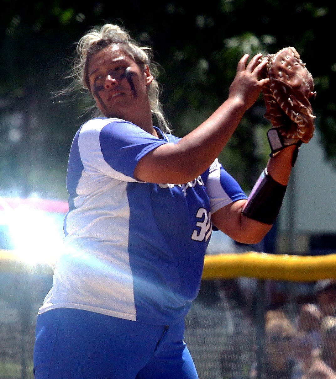 Rodney Harwood/Columbia Basin Herald
Warden first baseman Amanda Contreras chases down a fly ball in foul territory for the out during Saturday's action at the 1A state softball tournament in Richland. Contreras is headed to Mt. Hood Community College next fall to play softball.