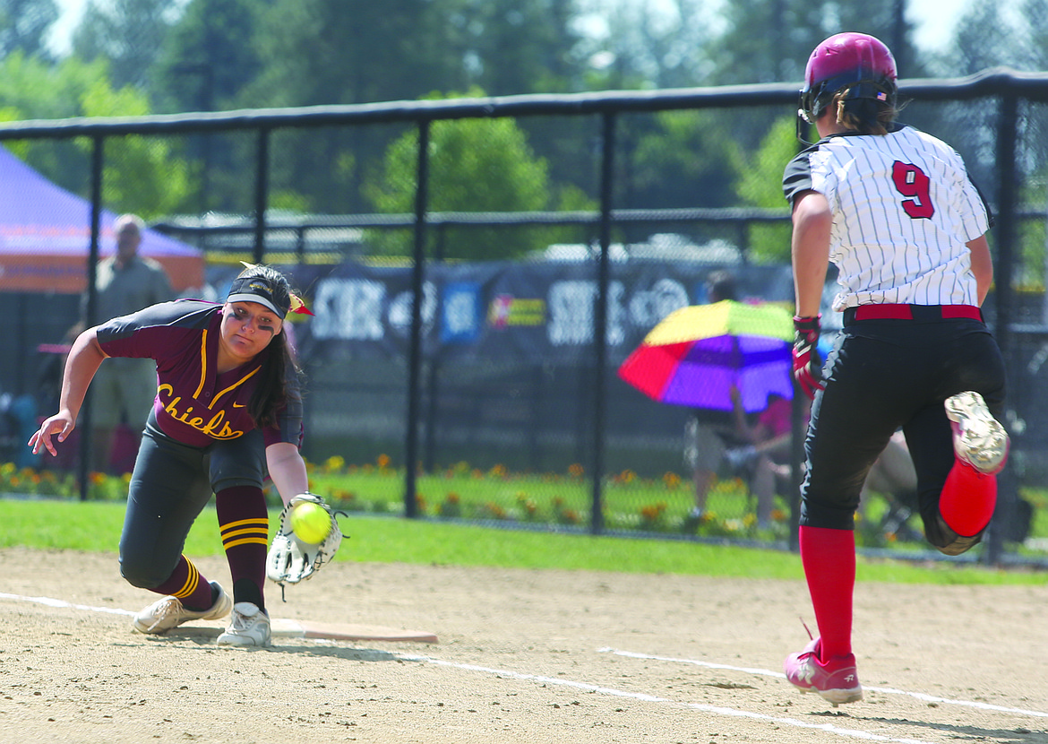 Connor Vanderweyst/Columbia Basin Herald
Moses Lake first baseman Brooke Richardson stretches to force out Camas runner Sophie Franklin.