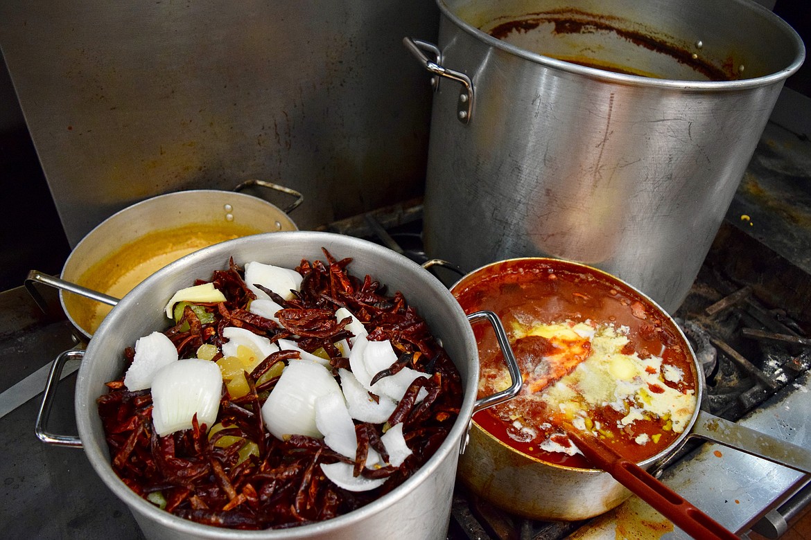 Charles H. Featherstone/Columbia Basin Herald
Sauces cooking on the stove at Los Amigos.