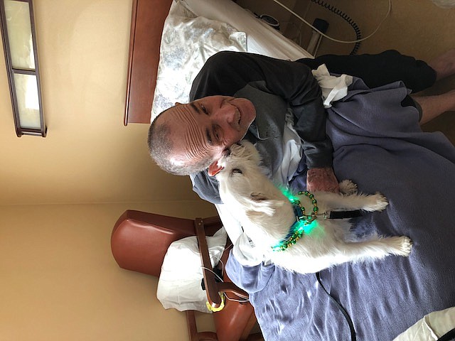 Walter White gives Larry Miller some love at a care facility where Larry stayed during a cancer scare.