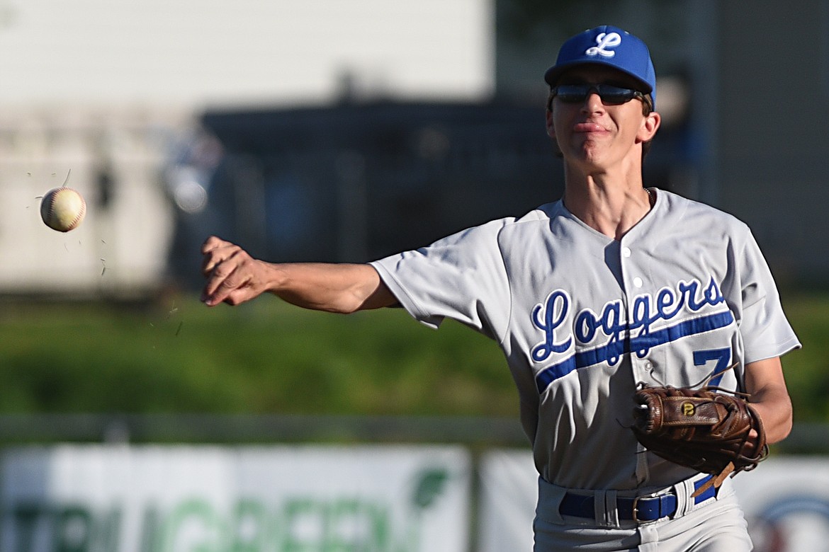 Libby second baseman Moxley Roesler-Bagalke fields a grounder and throws to first against Kalispell Lakers B at Griffin Field in Kalispell on Tuesday. (Casey Kreider/Daily Inter Lake)