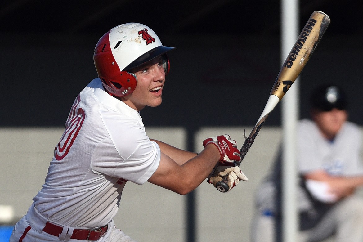 Kalispell Lakers B AJ Wood watches the flight of a fly ball against Libby at Griffin Field in Kalispell on Tuesday. (Casey Kreider/Daily Inter Lake)