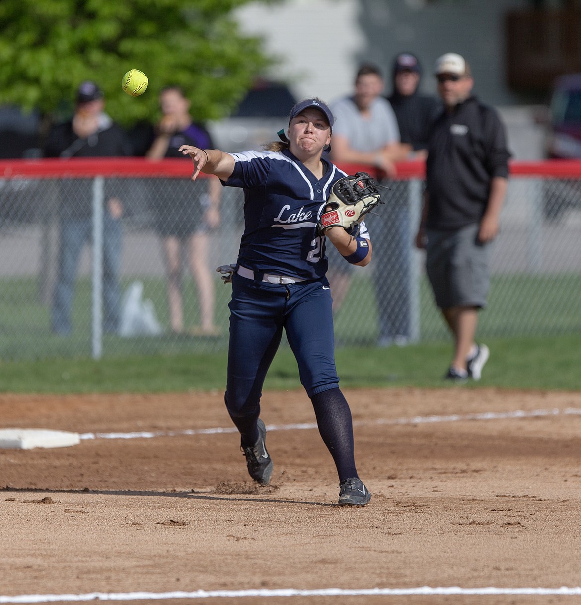 Photo by Jason Duchow Photography
Third baseman Abby Jankay of Lake City throws a Rocky Mountain runner out at first base Saturday morning at the state 5A softball tournament at Capell Park in Chubbuck. Rocky won 5-1 to eliminate the Timberwolves, who finished tied for fifth.