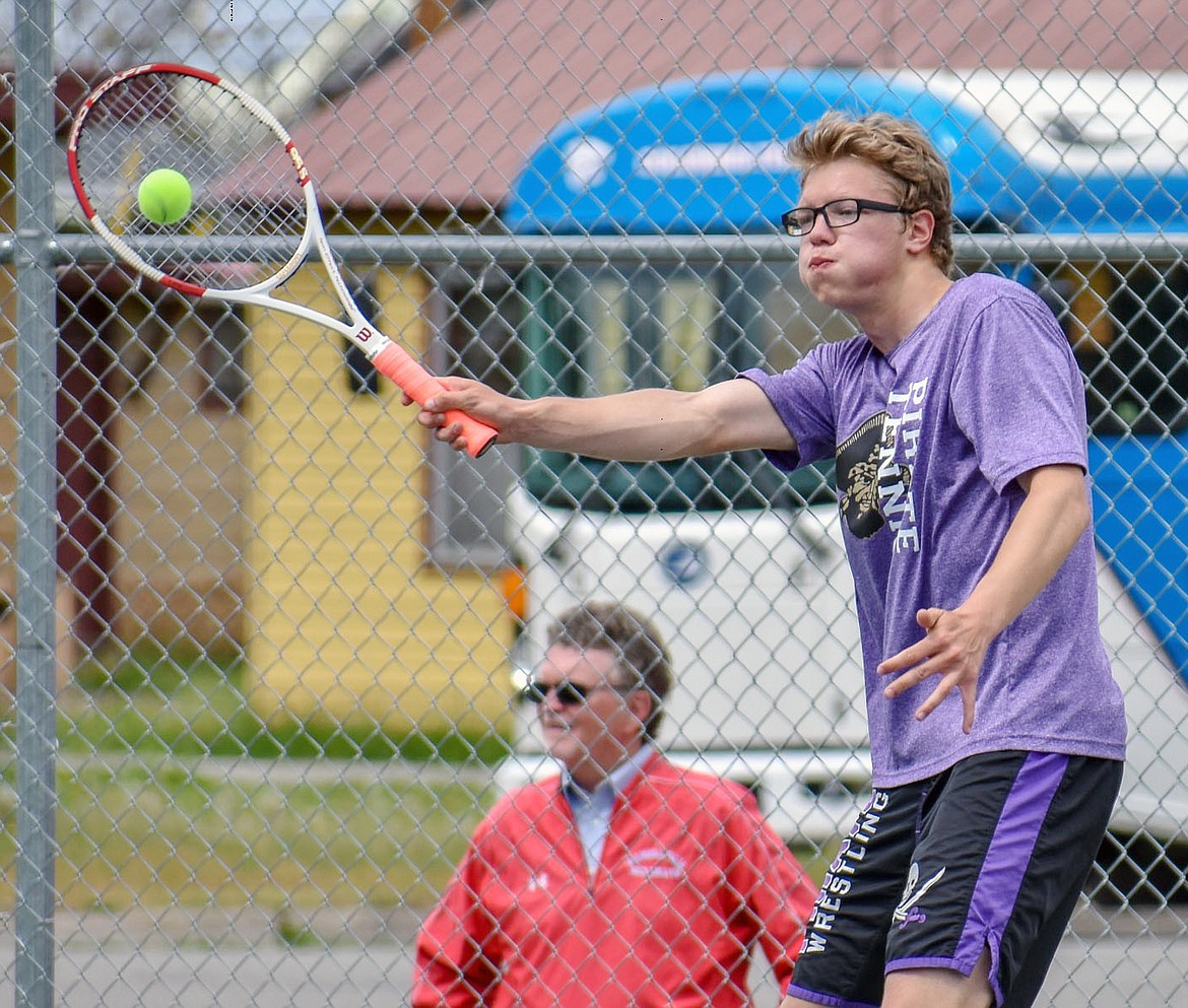 POLSON HIGH School tennis player Johnny Moore delivers a powerful forhand. (Benjamin Kibbey/Western News)