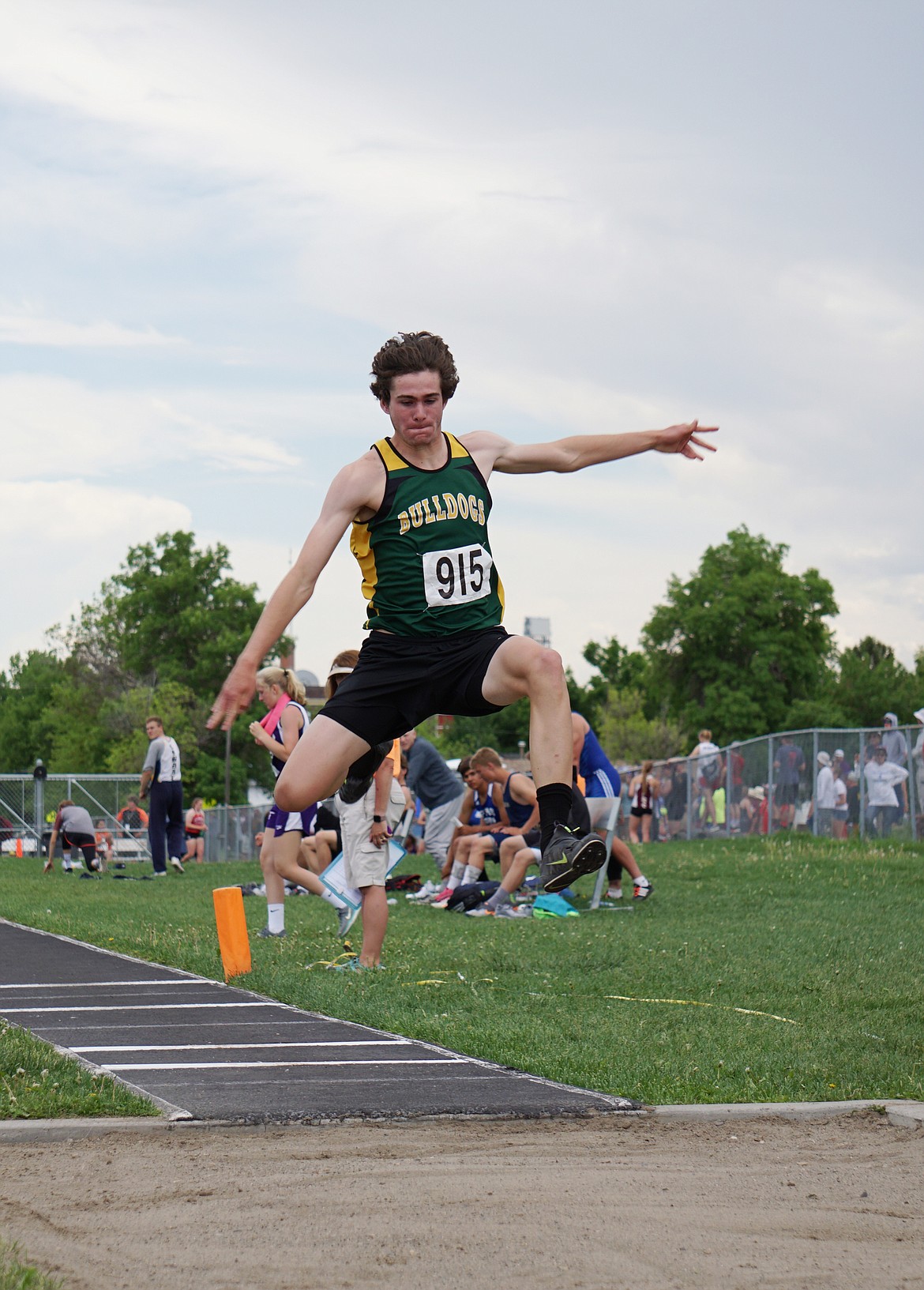 Sam Menicke competes in the triple jump at the state Class A track meet last weekend in Laurel. (Photo courtesy Matt Weller)