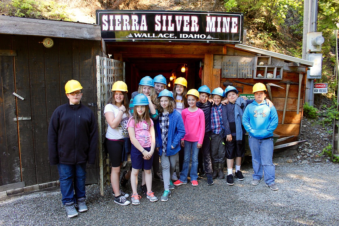 Members of Deanna Nearing&#146;s fifth-grade class pose for a quick picture before beginning their tour of the Sierra Silver Mine up Nine Mile Canyon in Wallace.