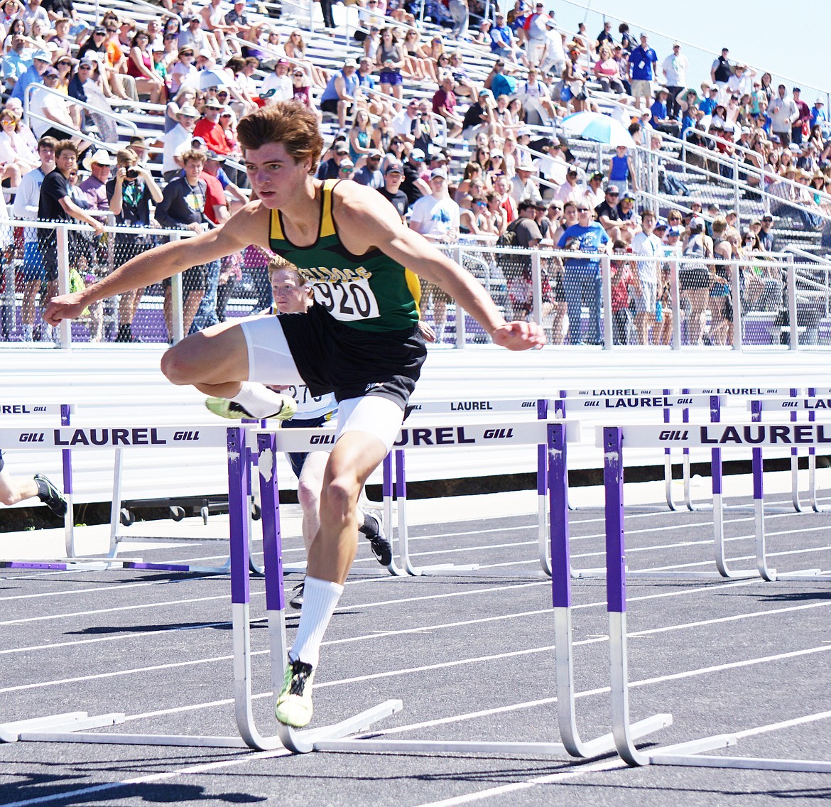 Whitefish's Lee Walburn competes in the 110 hurdles during the Class A state track meet in Laurel last weekend. (Photo courtesy Matt Weller)