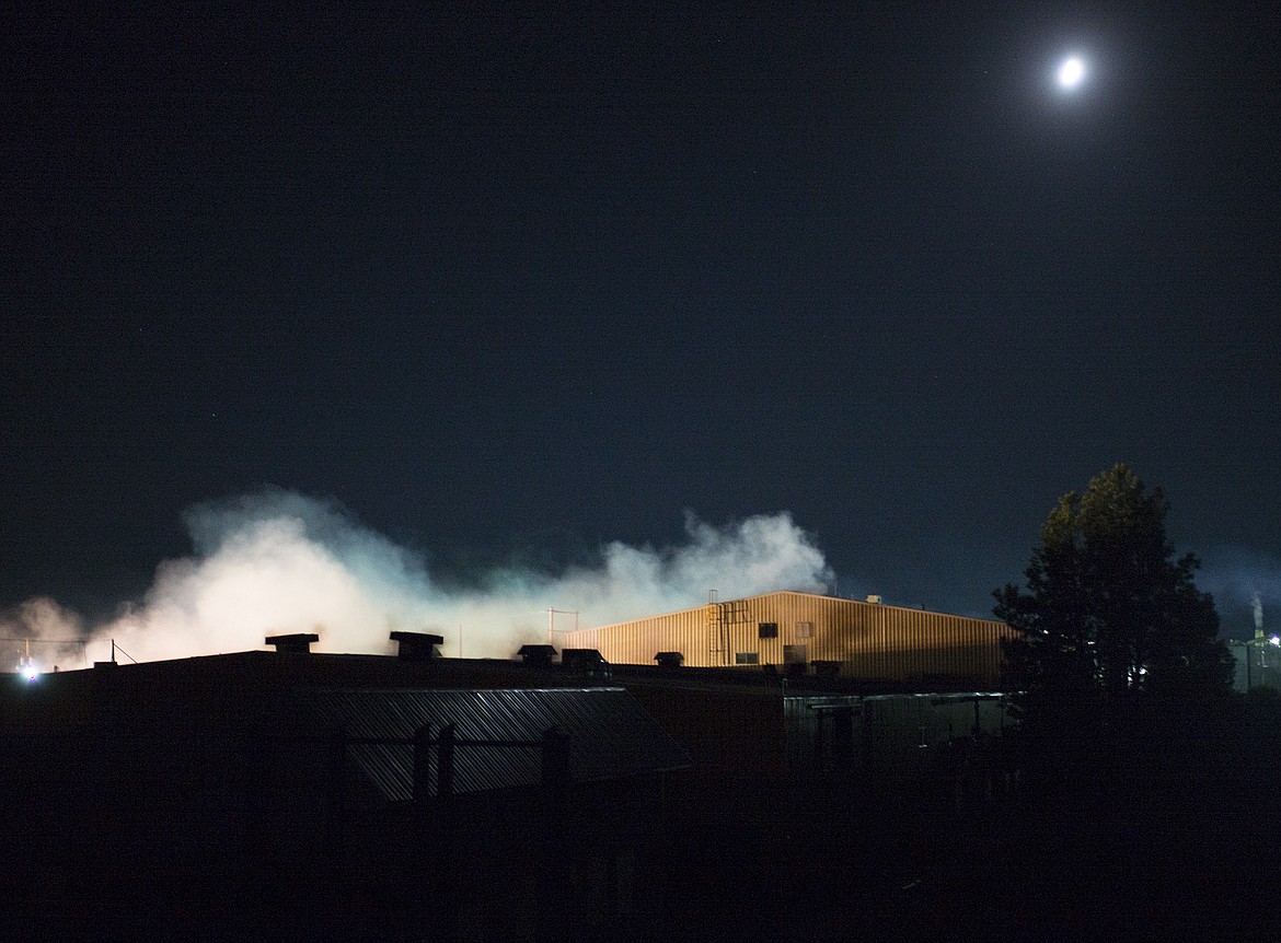 Smoke rises from a  fire at the old Plum Creek sawmill Wednesday morning.