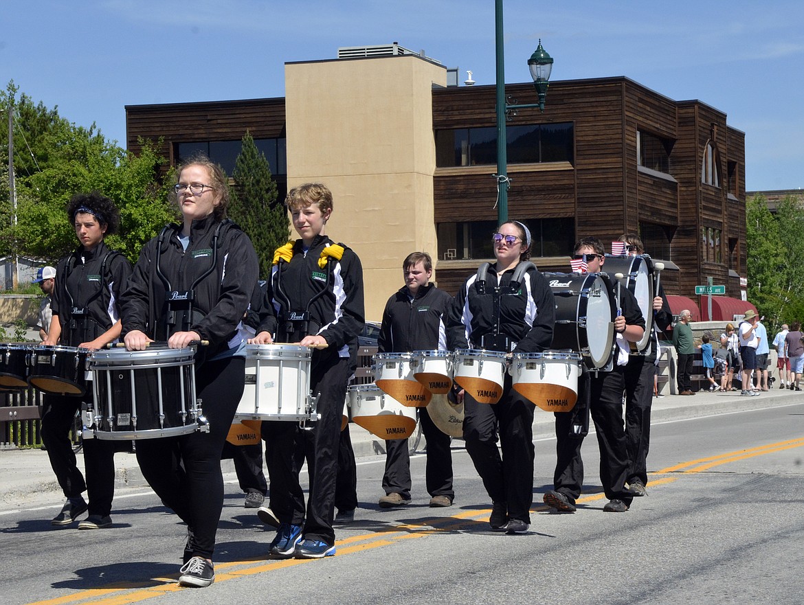 The Whitefish High School Drumline marches Monday in the Memorial Day parade. (Heidi Desch/Whitefish Pilot)