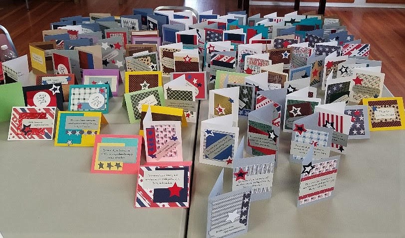 Members of the DeBorgia Historic School House gathered to make greeting cards to send in care packages for servicemen around the world earlier this month. Another card making session will take place on May 24. (Photo courtesy of the DeBorgia Historic School House).