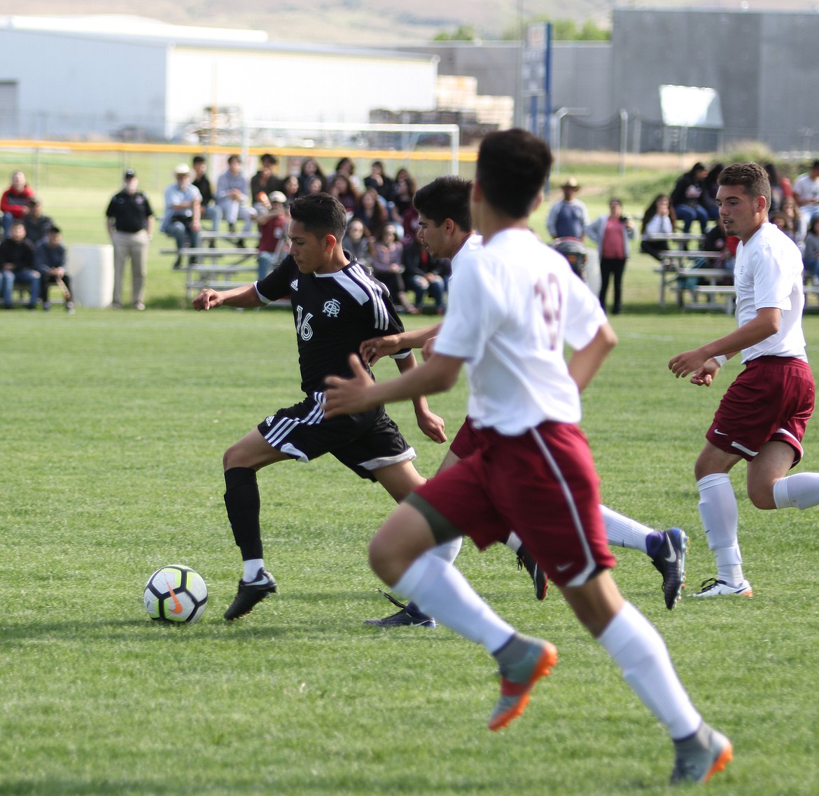 Bob Kirkpatrick/The Sun Tribune - Eliseo Romero breaks away from a pack of Scotties during second half action. Romero scored the only goal of the match just eight minutes into the contest.