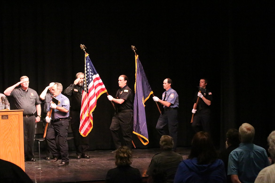 Photo by MANDI BATEMAN
The Boundary County Fire Service Honor Guard presents the colors during Friday&#146;s Peace Officer Memorial Observance at Bonners Ferry High School.