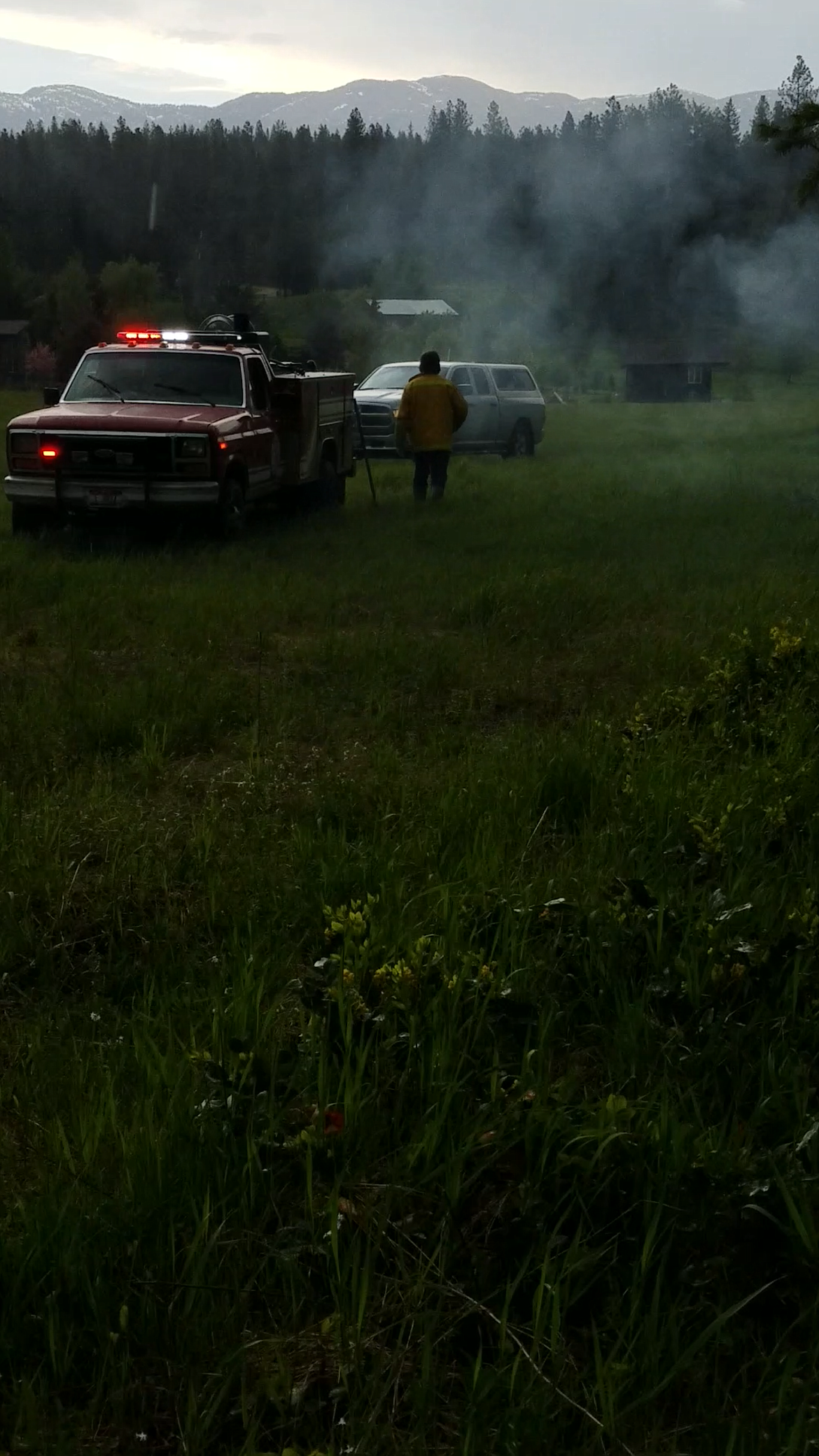 Photo by MORGAN DRAXLIR
Crews working to put out the fire on Silver Springs Rd.