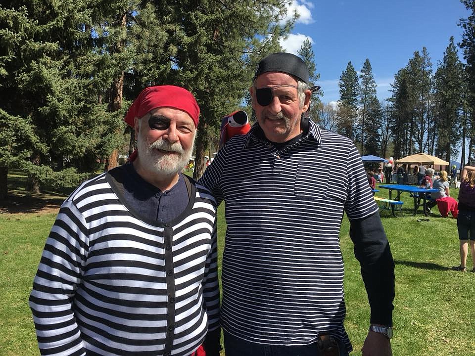 Pirates Tom McCloskey (left) and Don Pickering (right) helped donors “walk the plank” during an April 22 fundraiser for the Pool in the Park project. The fundraiser made $7,000 toward either refurbishing or building a new town pool in Superior. (Photo courtesy of Pool in the Park)