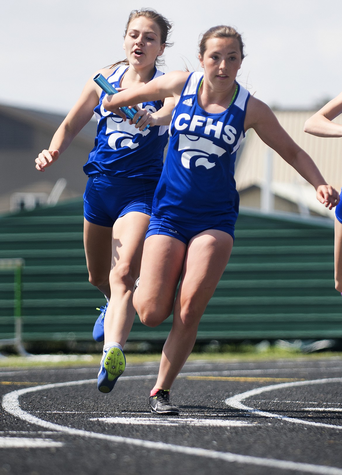 Wildkat 400-meter relay runners LaKia Hill and Alexis Purcell, along with Paige Burger and Josie Windauer, will be going to state. (Jeremy Weber photo)