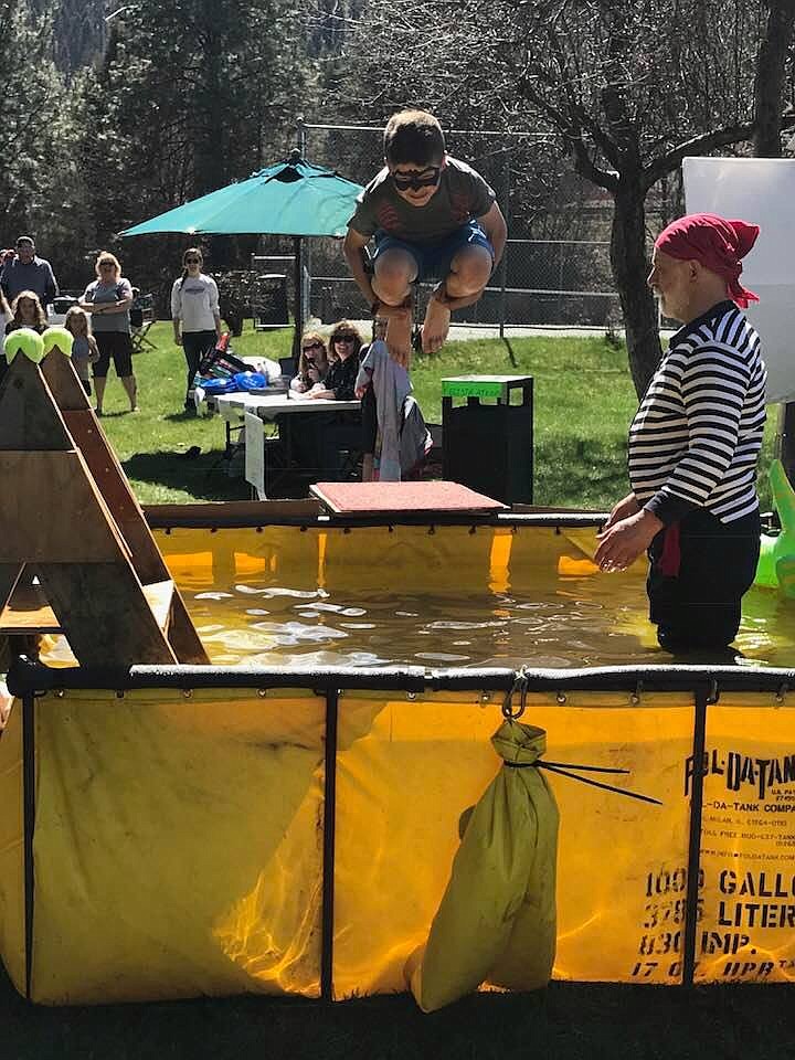 Turner Milender was one of 30 donors to &#147;walk the plank&#148; but instead, &#147;jumped the plank&#148; as part of a fundraiser held in Eva Horning Park last month to raise funds for a new pool in Superior. (Photo courtesy of Pool in the Park)