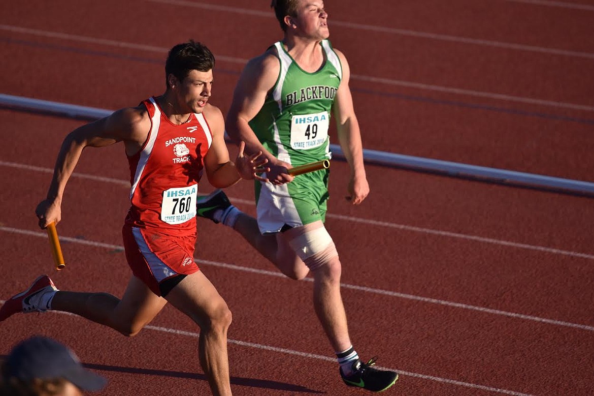 (Photo by SAYDEE BRASS)
Julian Barajas, left, runs a leg on the 4x100 relay, one of four events for the senior.