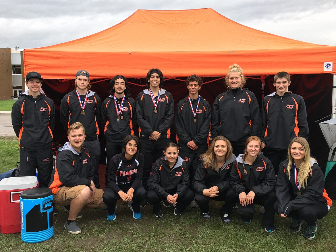 THE PLAINS boys and girls track team pose at the Divisional meet at Frenchtown. (photo courtesy of Denise Montgomery)