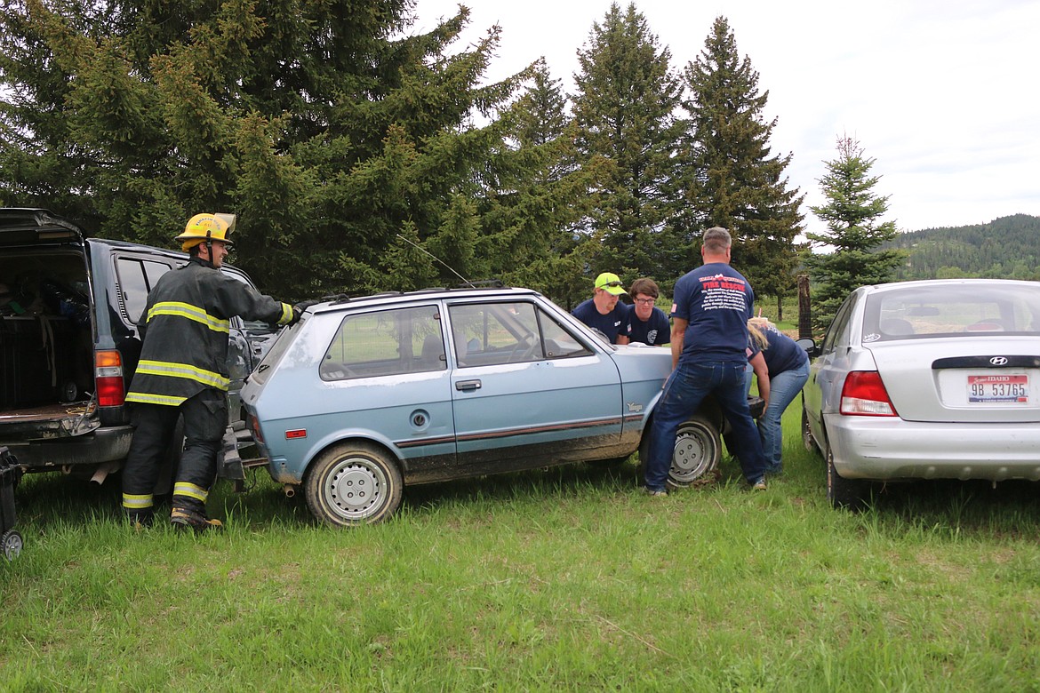 Photo by MANDI BATEMAN
Granite A. ... think twice about parking your Yugo around a bunch of firefighters.