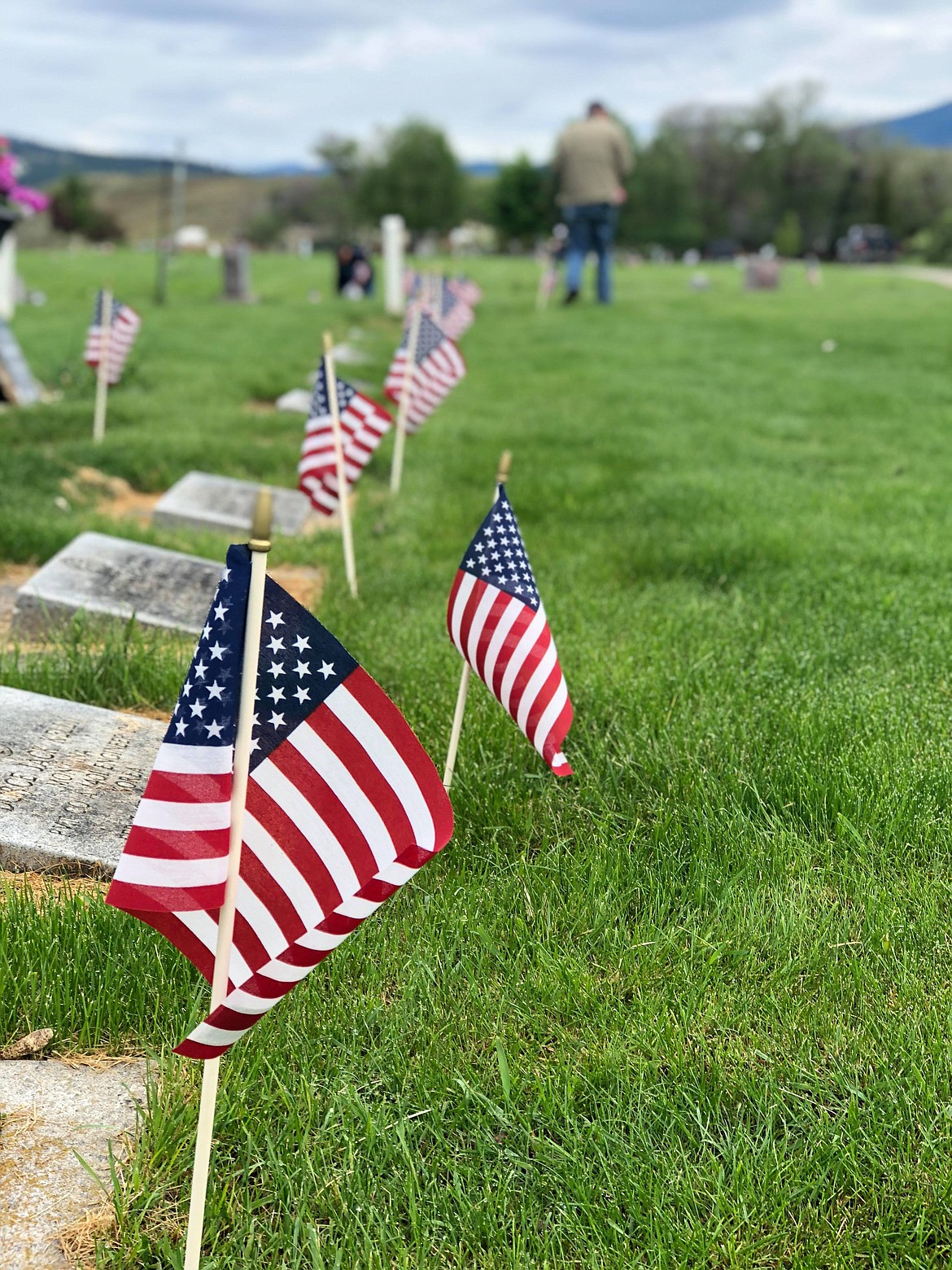 Flags set at the rsting place for all veterans at Plains Cemetery (Erin Jusseaume/ Clark Fork Valley Press)