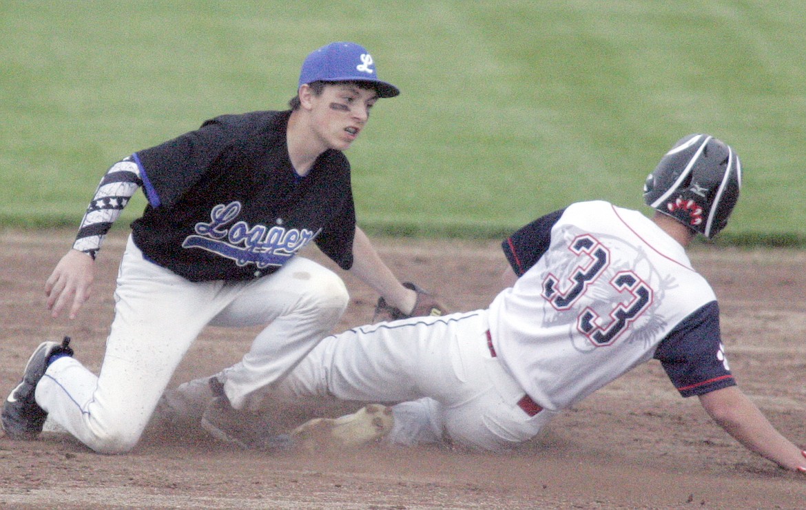 Second baseman Alex Svendsbye puts the tag on the Cougs&#146; Logan Wood on a throw from catcher Quade Anderson for the second out top of fifth inning. (Paul Sievers/The Western News)